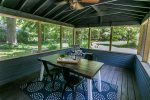 Outdoor dining in the screen porch
